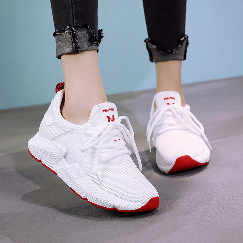 Women Lace Up Tennis Shoes