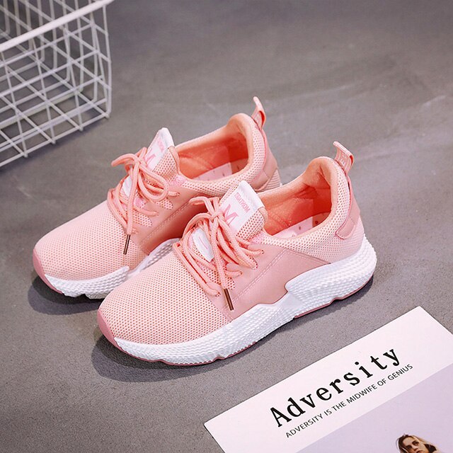 Women Lace Up Tennis Shoes