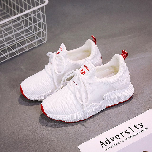 Women Lace Up Tennis Shoes